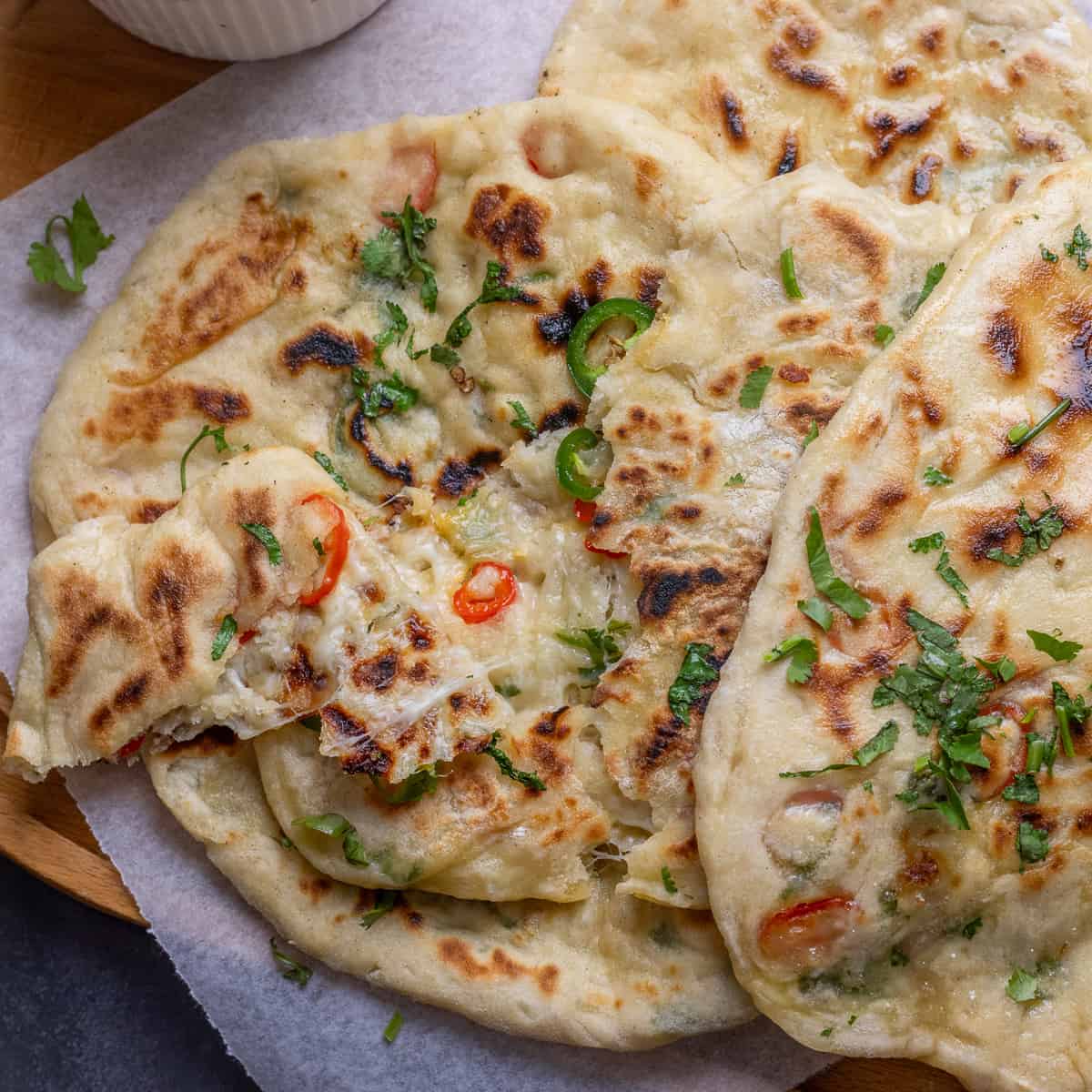 Naan-Garlic/Bullet/Onion or Aloo Paratha